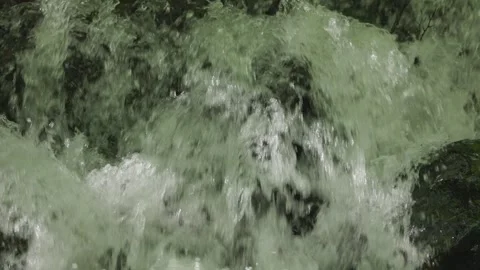A stormy waterfall in a spring mountain forest Stock Footage 310091093