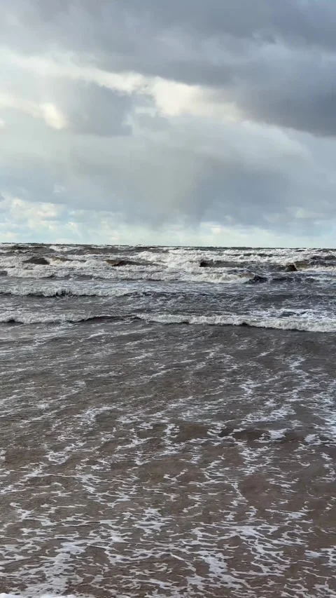Stormy waves and dramatic sky at the beach Stock Footage 277699276