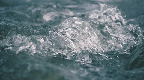 Stormy waves and swirls on the surface of the river.  Slow mo, slo mo Stock Footage