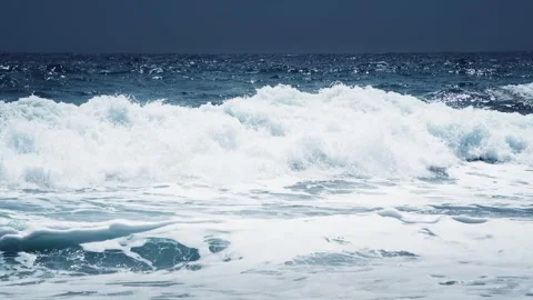 Stormy waves on the beach in windy day. Video stock 255636342