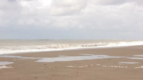 Stormy waves breaking on the beach Stock Footage 32822583