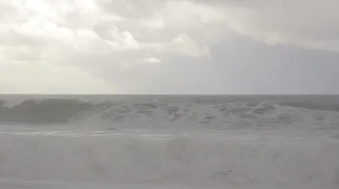 Stormy waves breaking on the beach Stock Footage 32846429