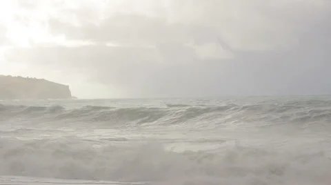 Stormy waves breaking on the beach Stock Footage 32850363