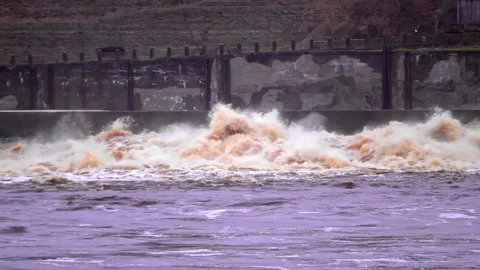 Stormy waves on the river boil Stock Footage 168914046