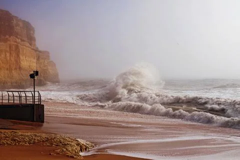 Stormy weather on the beach. Stock Photos