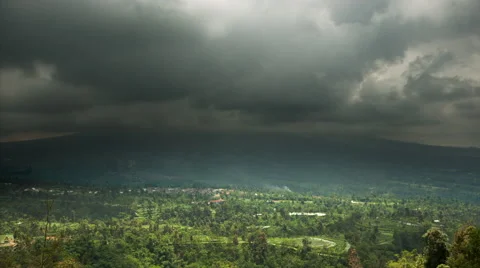 Stormy weather clouds the summit of Mount Merapi Stock Footage 45351546
