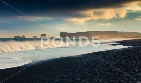 Stormy weather on the Kirkjufjara beach. Stock Photos