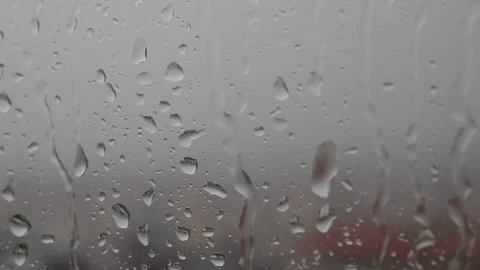 Stormy weather , rain drops falling on the window, thunder and dark gray sky Stock Footage 158729684