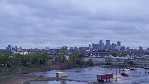 Stormy Winter Clouds over Minneapolis and Highway Traffic Stock Footage 81146013