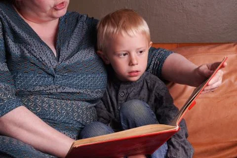 Story time in the couch Stock Photos