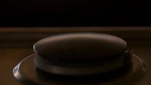 Stove being turned on Video stock 128030049