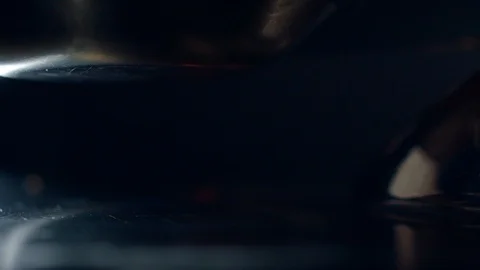 On the stove is burning fire under the frying pan. 4K slow motion video Stock Footage 111753746