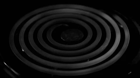 Stove element warming up in monochrome Stock Footage 50660629