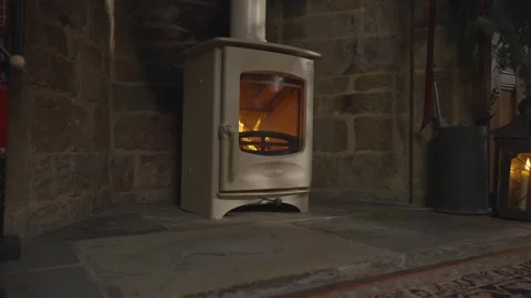 A stove with a fire burning in it Stock Footage 302470616