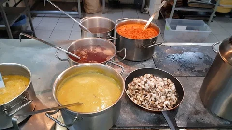 On the stove pans of soup Stock Footage 103530563