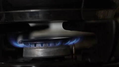 Stove Puts off the Flame due to lacking Gas, Russia Cuts the Energy Stock Footage 219634457
