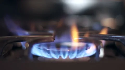 Stove top burner igniting in 4K slow motion Video stock 61611684