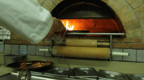 Stove used chiefly for baking bread and pitta or bake Pizza Wood Fired Oven Stock Footage 38039817