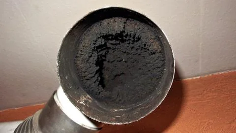 Stovepipe full of soot Stock Photos