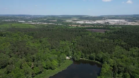 Stover Country Park, S. Devon, England: DRONE VIEWS: Woodland and Stover Lake Stock Footage 242078422
