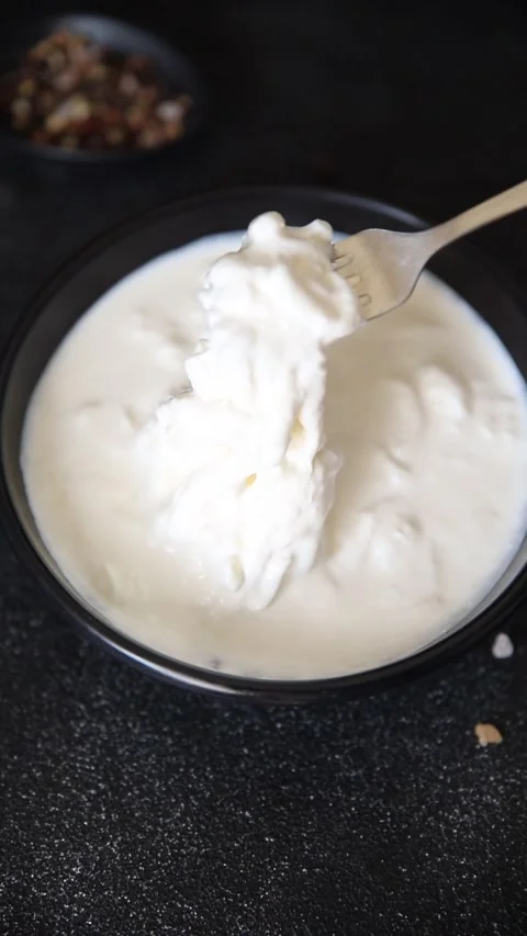 Stracciatella cheese soft young portion size Italian food natural tasty food Stock Footage 320799179