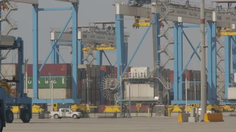 Straddle Carriers With Container Cranes Stock Footage 63086099