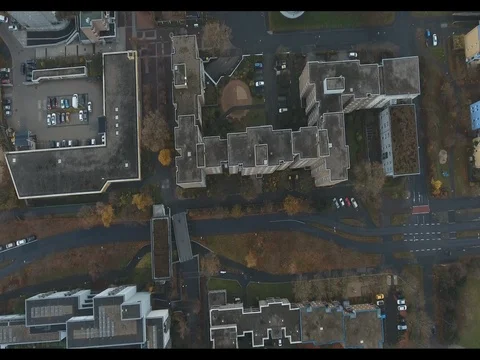 Straight above shot of streets while cars and people moving Stock Footage 77064666