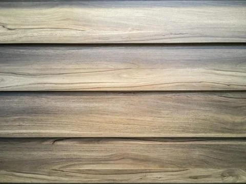 Straight angle view, brown wall of a house made of sawn teak. Fotos de archivo