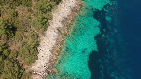 Straight-down aerial drone view of a rocky Stock-Footage 336045612