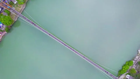 Straight down decending aerial drone shot of ram setu suspension bridge over the Stock Footage 240551689