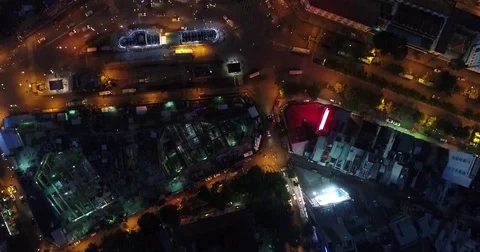 Straight Down on a Night Bus Terminal and Long Hoarding 스톡 동영상 71655271