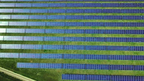 Straight Down straight rows Solar Panel Power Plant providing Clean Renewable Stock Footage 135238015