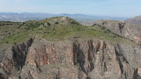 Straight flight to the summit cross of Mount Muela near the city of Orihuela. Stock Footage 132553187