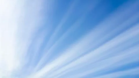 Straight line clouds as sun rays Stock Photos