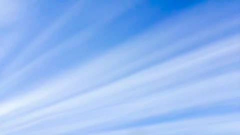 Straight line clouds as sun rays Stock Photos