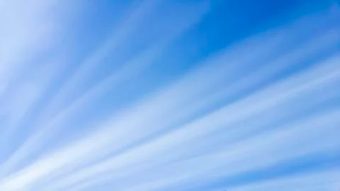 Straight line clouds as sun rays Stock Photos