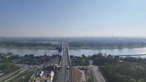 Straight low view across bridge roadway Stock Footage 335365814