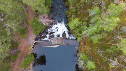 Straight norway small forest dam wooden walkway whitewater surges below calm Stock Footage 327628523