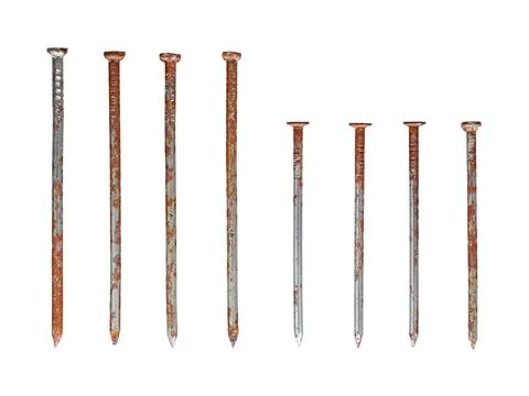 Straight old rusty nails half long and half short isolated on white Stock Photos