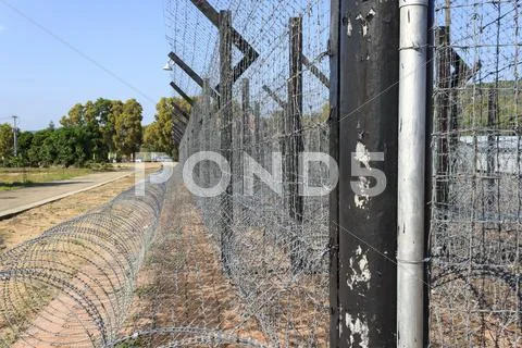 Straight prison fence Stock Photos