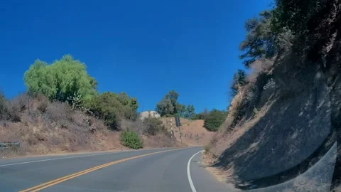 Straight run down an empty residential street, Los Angeles Video stock 343475604