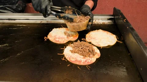 Straight Shot Of Adding Quesabirria Meat To Birria Tacos Stock Footage 342163238