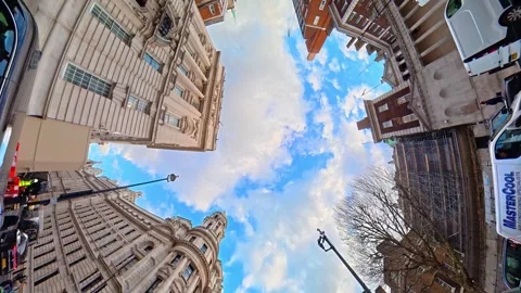 Straight Up To Sky and Clouds Through Central London City Stock Footage 328836434