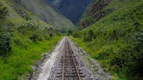 Straight Train Rails In Valley [Drone Footage] Stock Footage 87129474