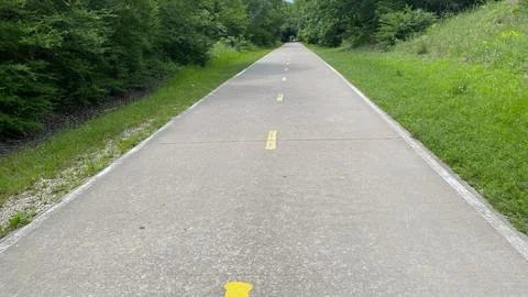 Straight View of Empty Concrete Nature Trail Stock Photos
