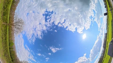 Straight UP View to Sky and Clouds During Long British Road Travel Stock Footage 333707441