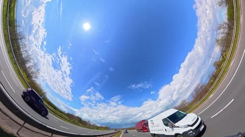 Straight UP View to Sky and Clouds During Long British Road Travel Stock Footage 333709457