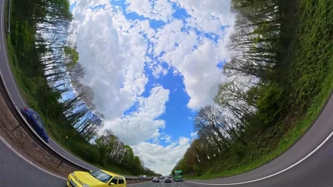 Straight UP View to Sky and Clouds During Long British Road Travel Stock Footage 333709467