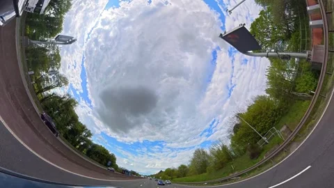 Straight UP View to Sky and Clouds During Long British Road Travel Stock Footage 333709484