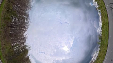 Straight UP View to Sky and Clouds During Long British Road Travel Stock Footage 333711164
